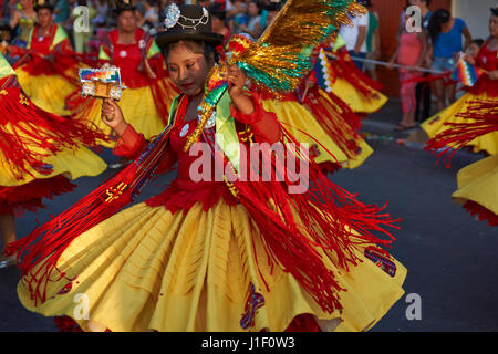 Morenada dancers in traditional Andean costume performing at the annual Carnaval Andino con la Fuerza del Sol in Arica, Chile. Stock Photo