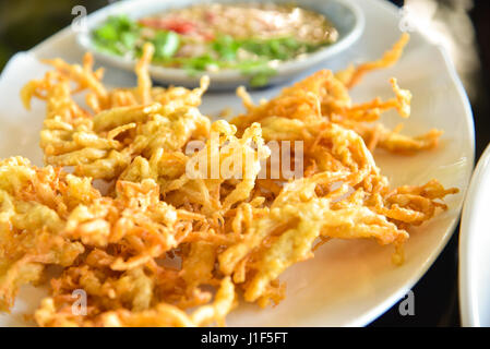 Enoki mushrooms fried Stock Photo