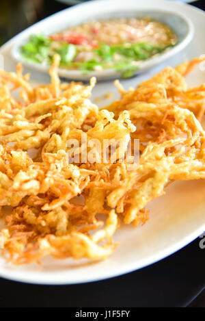 Enoki mushrooms fried Stock Photo