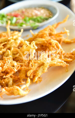 Enoki mushrooms fried Stock Photo