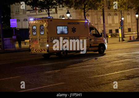 Paris, France. 20th Apr, 2017. An ambulance is parked at the Champs-Elysees. The Champs-Elysées avenue in Paris has been closed off by Police after an terror attack that cost the life of one Police officer. Credit: Michael Debets/Pacific Press/Alamy Live News Stock Photo