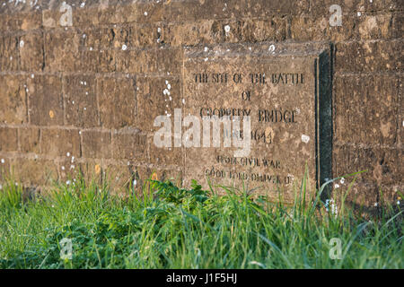 Battle of Cropredy Bridge stone plaque on the bridge in morning sunlight. Cropredy, Oxfordshire, England Stock Photo