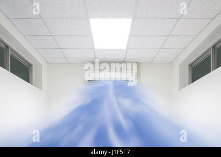 Air conditioner machine in white room. Stock Photo