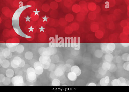 Singapore flag over bokeh background with copy space,  Independence day greeting card illustration design Stock Photo