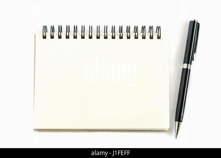 old recycle paper notebook right page with pen on white background Stock Photo