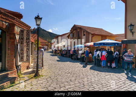 Mtskheta, Georgia - September 26, 2016: Market stalls with souvenirs for tourists on the street near Svetitskhoveli Cathedral Stock Photo