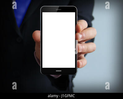 Male hand holding blank mobile smart phone Stock Photo