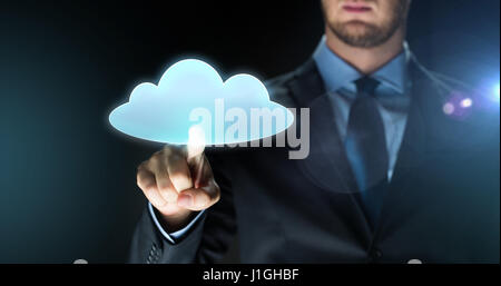 businessman touching virtual cloud projection Stock Photo
