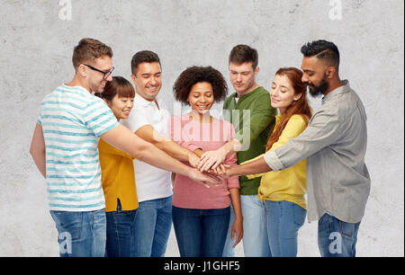 international group of happy people holding hands Stock Photo