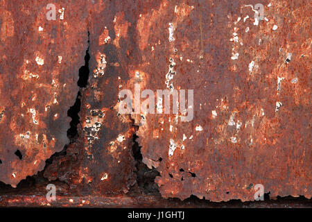 Closeup of old rusty metal background with crack Stock Photo