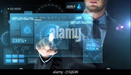 businessman touching virtual screen projection Stock Photo