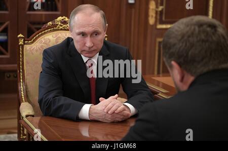 Russian President Vladimir Putin during a bilateral meeting with Chechen leader Ramzan Kadyrov at the Kremlin April 19, 2017 in Moscow, Russia. Stock Photo