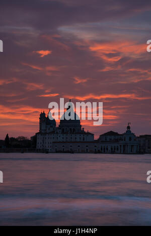 Venice Venezia spectacular sunset skyline with silhouette of Santa Maria della salute Stock Photo