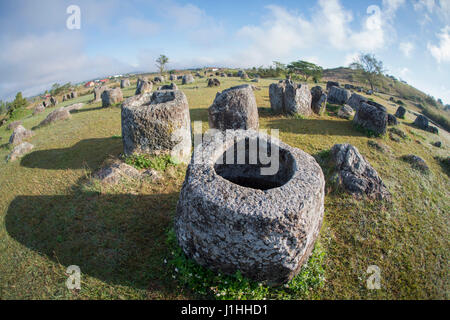 the plain of jars sit1 in the morning near the town of Phonsavan in the province Xieng Khuang in north Lao in southeastasia. Stock Photo