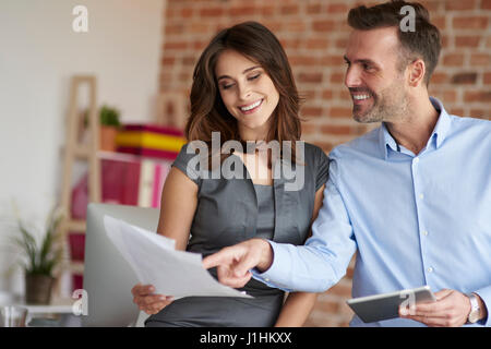Checking some documents in good mood Stock Photo