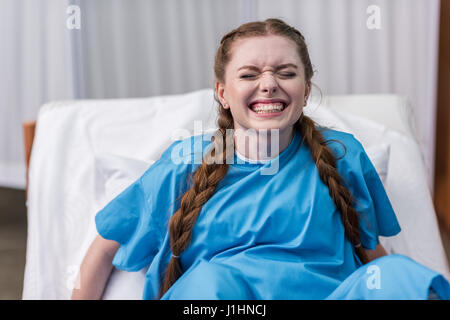 front view of pregnant woman giving birth in hospital Stock Photo