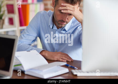 Man tired of this work Stock Photo