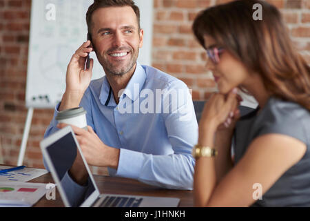 Office workers in good mood Stock Photo