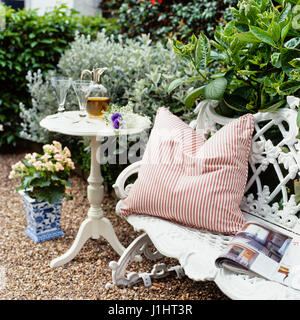 Striped cushion on bench. Stock Photo