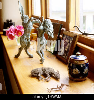 Surreal sculpture of woman dancing with rabbit. Stock Photo