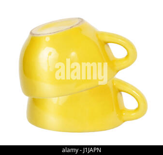 Two yellow cups isolated on white Stock Photo