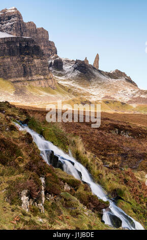 Snow covered Old Man of Storr with Loch leathan cascading down in the foreground, Isle of Skye, Highlands, Scotland Stock Photo