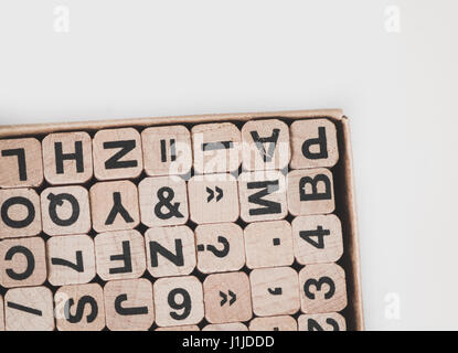 letters and numbers on wooden cubes - communication concept Stock Photo