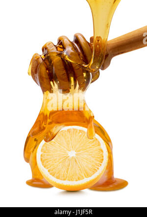lemon with honey isolated on a white background. Stock Photo