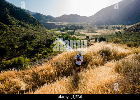 An adventure athlete trail running in the Sespe Wilderness near Ojai, California. Stock Photo