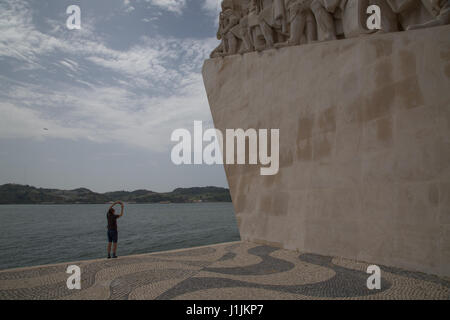 People taking photographs of the Monument to the Discoveries in Lisbon, Portugal. Stock Photo