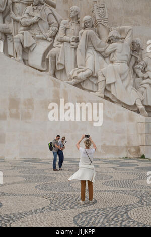 People taking photographs of the Monument to the Discoveries in Lisbon, Portugal. Stock Photo