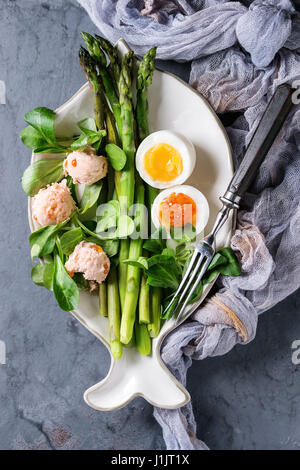 Cooked green asparagus with egg Stock Photo