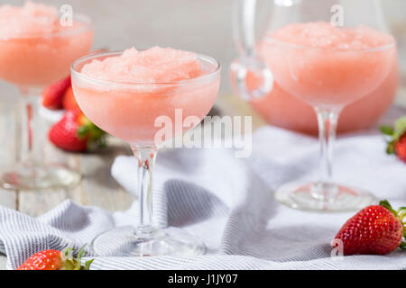 Cold Refreshing Frozen Frosé Rosé Wine Cocktail in the Summer Stock Photo