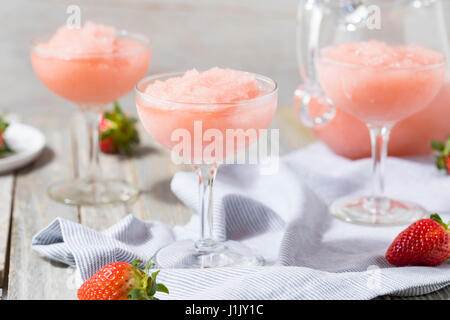 Cold Refreshing Frozen Frosé Rosé Wine Cocktail in the Summer Stock Photo