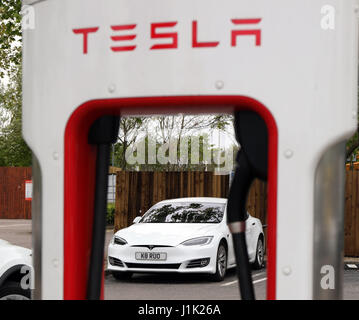 London, UK. 21st Apr, 2017. Pic shows: Pic shows Tesla Model S Tesla models X and S on charge at South Mimms Services on the M25 near London. Pic by Gavin Rodgers/Pixel 8000 Ltd Credit: Gavin Rodgers/Alamy Live News Stock Photo