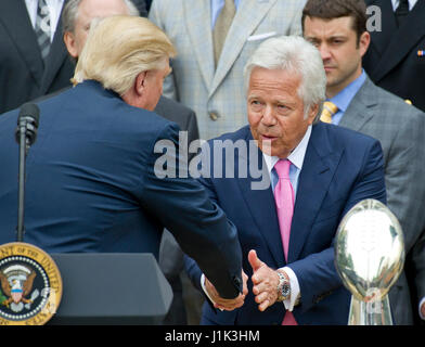 Washington, Us. 19th Apr, 2017. United States President Donald J. Trump shakes hands with New England Patriots owner Robert Kraft as he welcomes the Super Bowl Champs to the South Lawn of White House in Washington, DC on Wednesday, April 19, 2917. Credit: Ron Sachs/CNP (RESTRICTION: NO New York or New Jersey Newspapers or newspapers within a 75 mile radius of New York City) - NO WIRE SERVICE- Photo: Ron Sachs/Consolidated/dpa/Alamy Live News Stock Photo