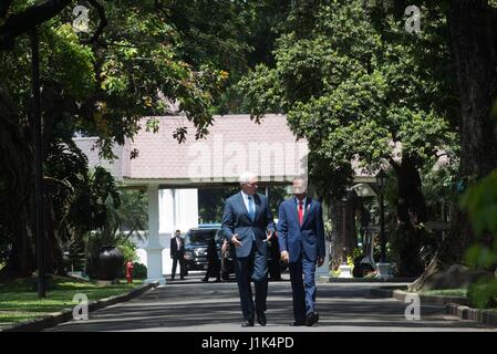 U.S. Vice President Mike Pence, left, walks alongside Indonesian President Joko Widodo during their meeting at the Merdeka Palace April 20, 2017 in Jakarta, Indonesia. Stock Photo