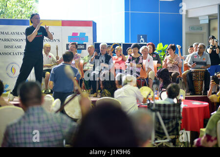 Kuala Lumpur, Malaysia. 22nd Apr, 2017. People suffered with Parkinson's disease play percussion music during an event to promote awareness of Parkinson's disease in Kuala Lumpur, Malaysia, on April 22, 2017. Credit: Chong Voon Chung/Xinhua/Alamy Live News Stock Photo