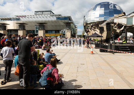 Bristol, UK. 22nd Apr, 2017. Large crowds assemble in Millenium Square, Bristol ahead of the March for Science Credit: Rob Hawkins/Alamy Live News Stock Photo