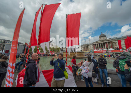 Trafalgar Square, London, UK. 22nd Apr, 2017. London celebrates St Georges Day at the Mayor of London's annual Feast of St George. The square is lined with stalls selling traditional English food, inspired by the 13th century origins as a day of feasting. St Georges Day falls on the 23rd April. Credit: Malcolm Park/Alamy Live News Stock Photo