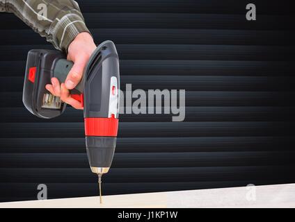 Digital composite of Hand doing hole on a wood in front of blind Stock Photo