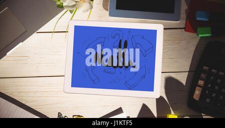 Digital composite of High angle view of math test in digital tablet by office supplies on table Stock Photo