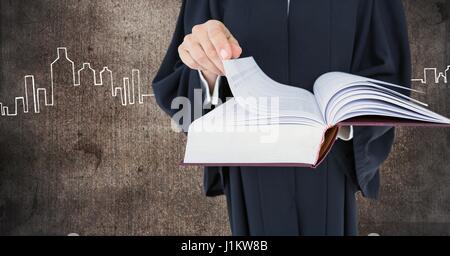 Digital composite of Judge holding book in front of grunge wall with city drawings Stock Photo