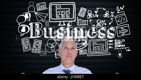 Digital composite of Senior businessman looking up at text surrounded by icons Stock Photo