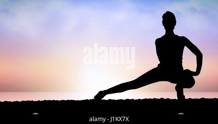 Digital composite of Sportsperson doing exercise against sky during sunset Stock Photo