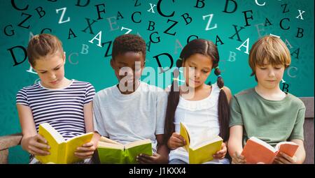 Digital composite of Digital composite image of children studying on sofa with letters flying in background Stock Photo