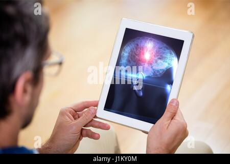 Digital composite of Man using tablet for science Stock Photo