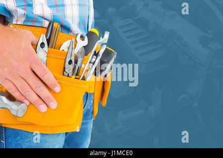 Digital composite of Midsection of handyman with tools Stock Photo