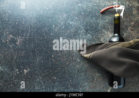Bottle of wine with corkscrew. Top view. Stock Photo