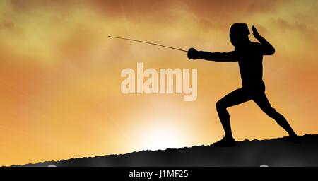 Digital composite of Silhouette man practicing fencing sport during sunset Stock Photo